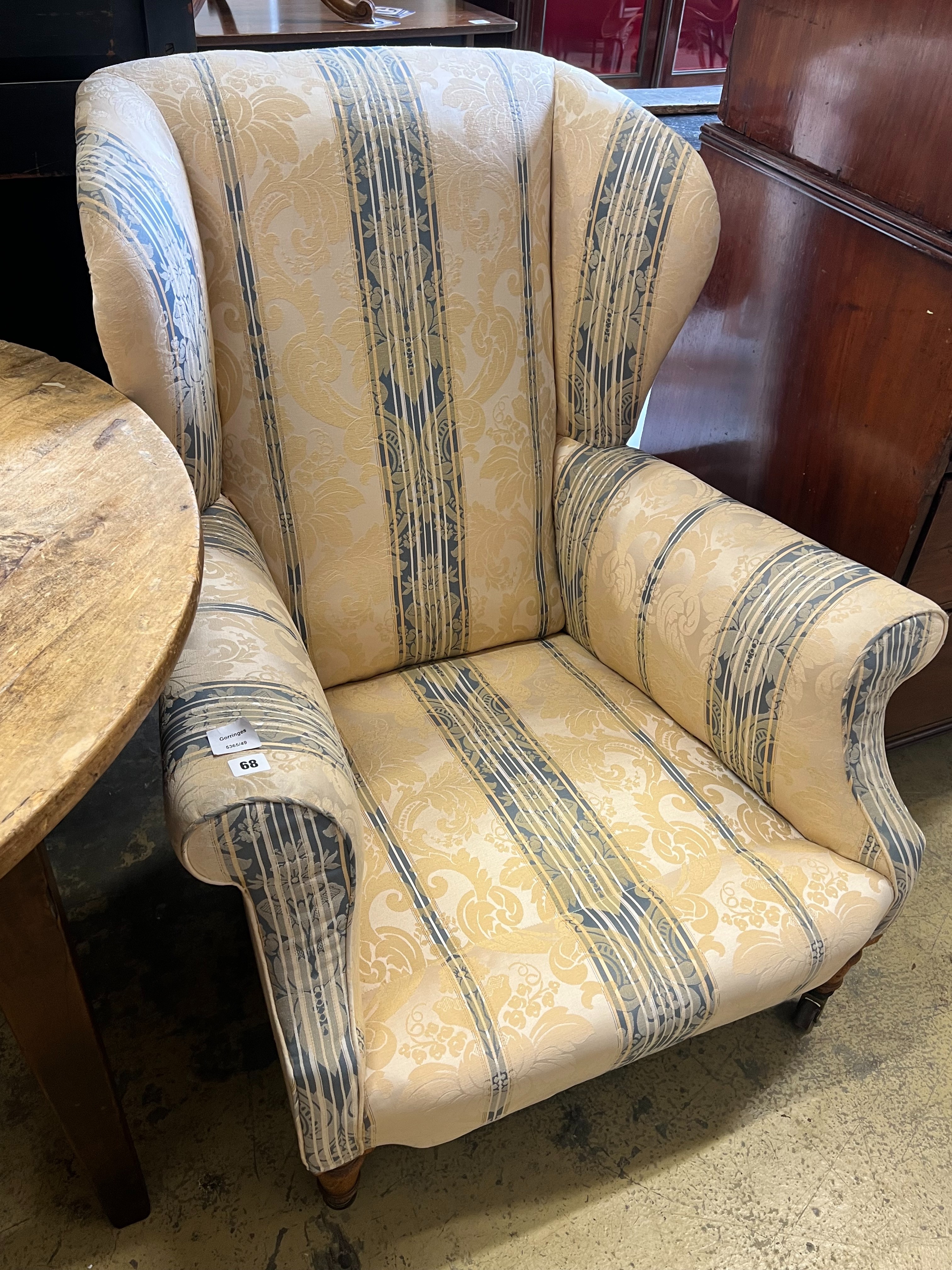 A late Victorian oak armchair